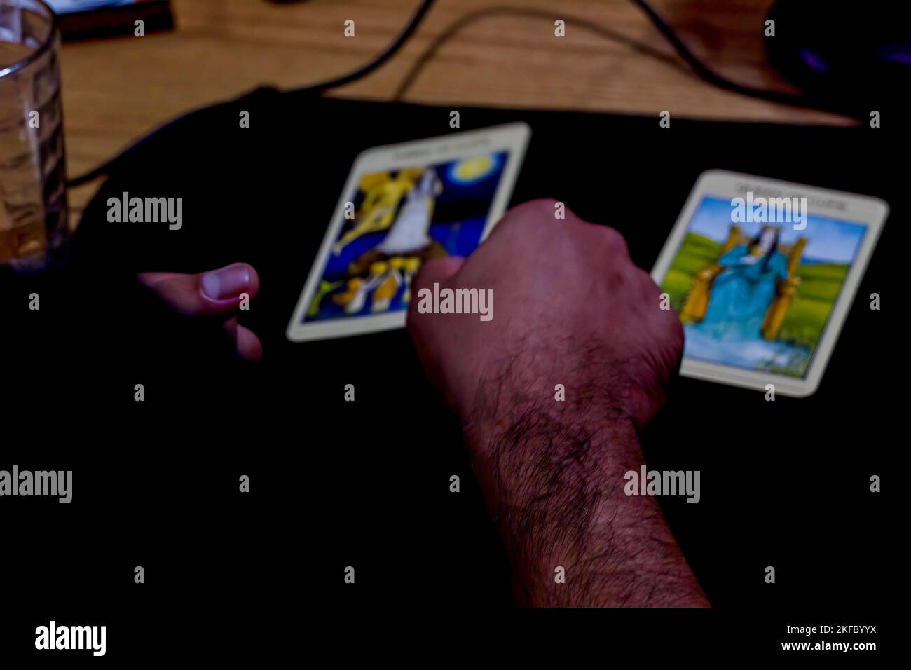 young man reading tarot cards in a meeting with his friends, mexico latin america, 4k Stock