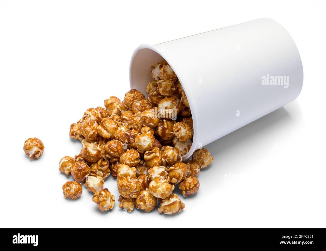 Spilled Tub of Caramel Corn Cut Out. Stock Photo