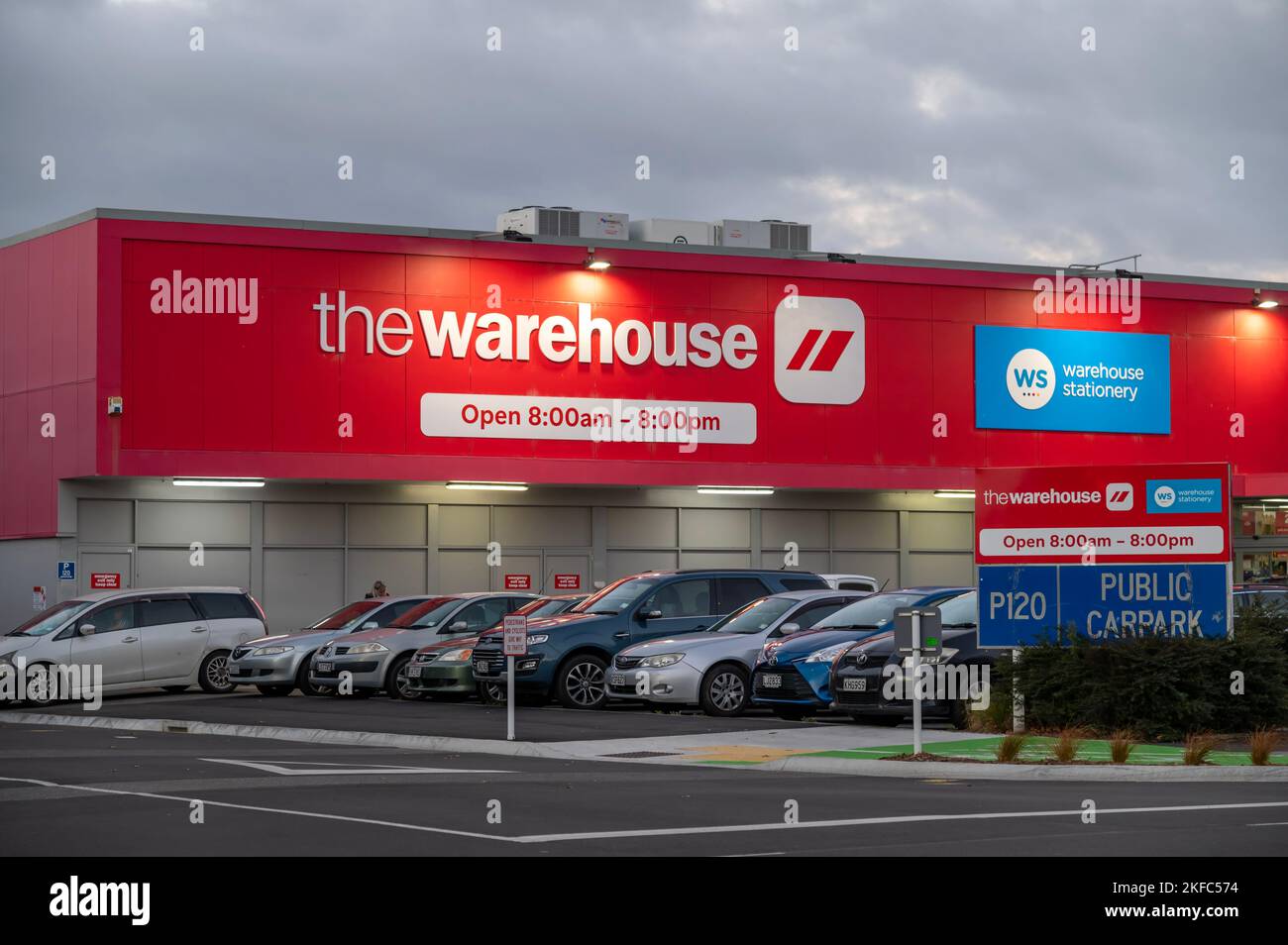 The parked cars near "The Warehouse" large shop Stock Photo Alamy