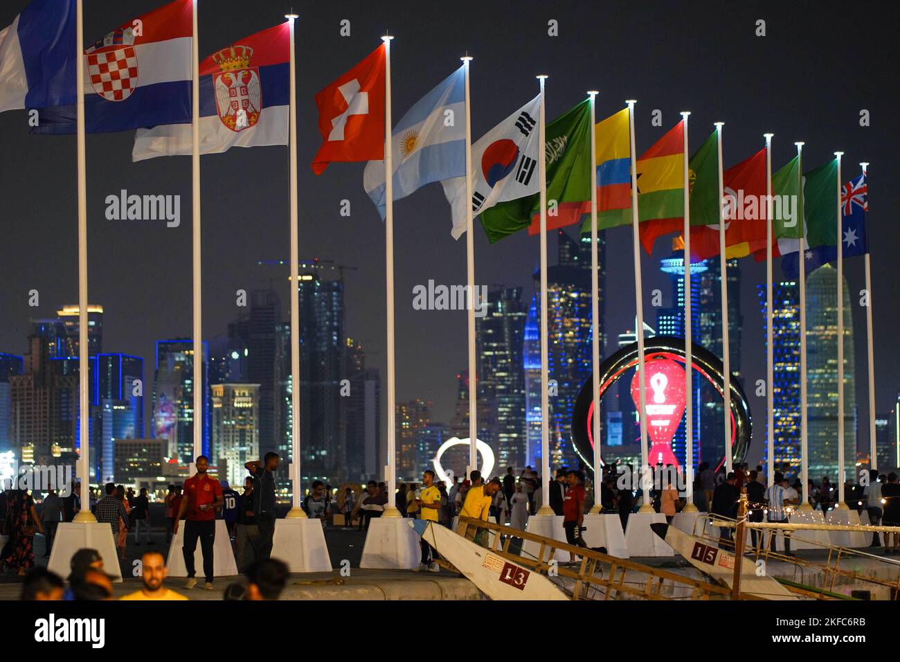 People visit the FIFA World Cup Qatar 2022 countdown timer and the