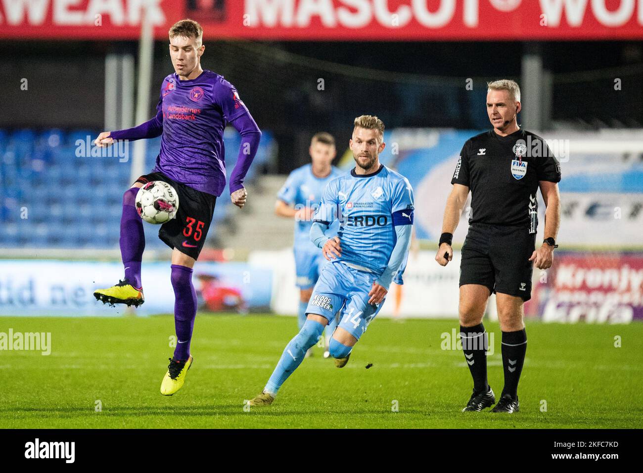Randers, Denmark. 13th, November 2022. Charles (35) of FC Midtjylland and Frederik Lauenborg (14) of Randers FC seen during the 3F Superliga match between Randers FC and FC Midtjylland at Cepheus Park in Randers. (Photo credit: Gonzales Photo - Balazs Popal). Stock Photo