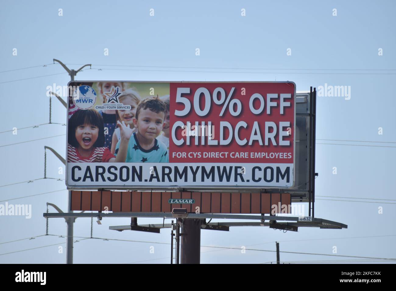 COLORADO SPRINGS, Colo. — A billboard advertises the 50% off child care for Child Youth Services direct care employees located off South Academy Boulevard Sept. 6. This is in support of CYS’s effort to fill roughly 200 direct care positions on Fort Carson. (Photo by Norman Shifflett) Stock Photo