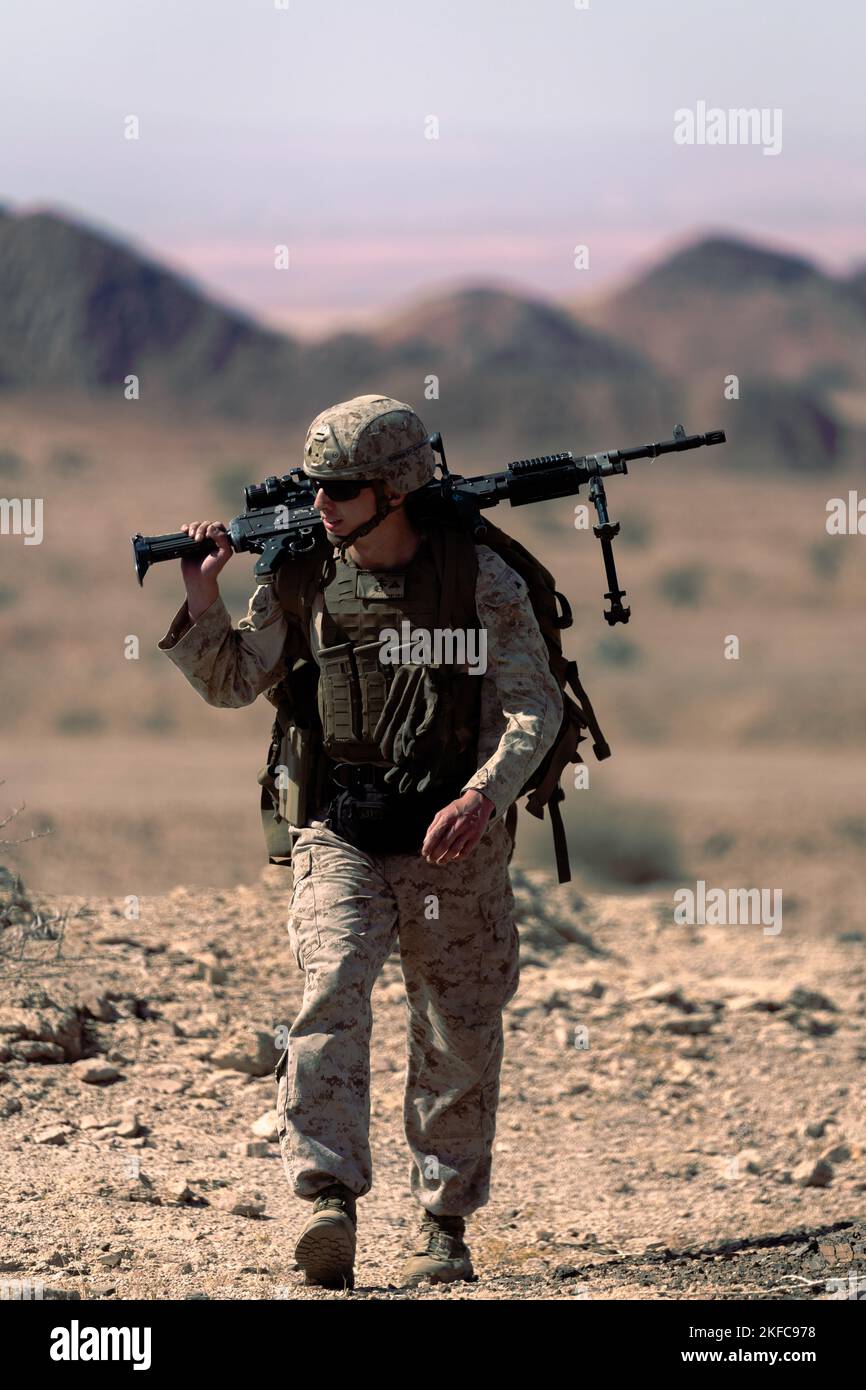 CAMP TITIN, Jordan - U.S. Marine Corps Lance Cpl. Harrison Preston, assigned to Fleet Anti-Terrorism Security Team Central Command (FASTCENT), prepares for a live fire squad attack range during Exercise Eager Lion 22 at Camp Titin, Jordan, September 7, 2022. Eager Lion 22 is a multilateral exercise hosted by the Hashemite Kingdom of Jordan, designed to exchange military expertise, and improve interoperability among partner nations, and considered the capstone of a broader U.S. military relationship with the Jordanian Armed Forces (JAF). Jordan is one of U.S. Central Command’s (USCENTCOM) stron Stock Photo