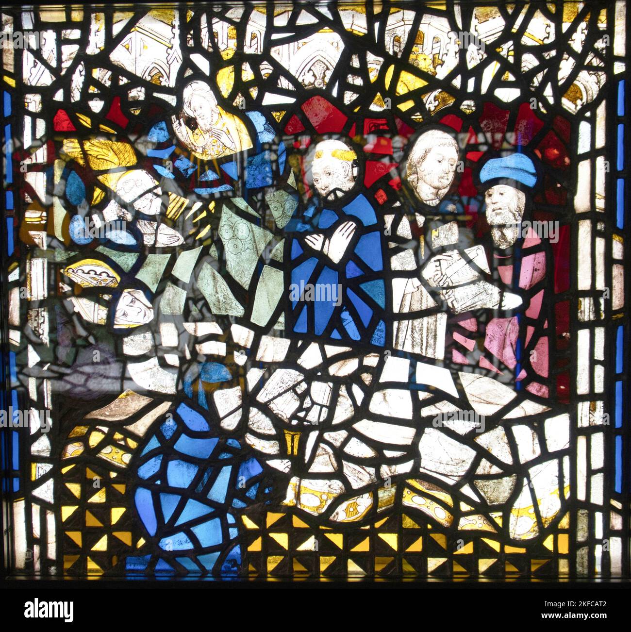15th Century Stained-glass panel featuring St.Cuthbert on his deathbed surrounded by mourners, on display in York Minster, York ,North Yorkshire Stock Photo