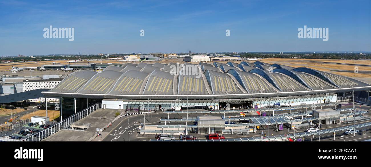 London, England - August 2022: Aerial panoramic view of the drop off zone and entrance to Terminal 2, The Queen's Terminal, at London Heathrow airport Stock Photo