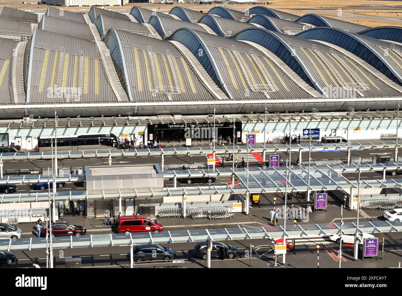 London, England - August 2022: Aerial view of the drop off zone and entrance to Terminal 2, The Queen's Terminal, at London Heathrow airport Stock Photo