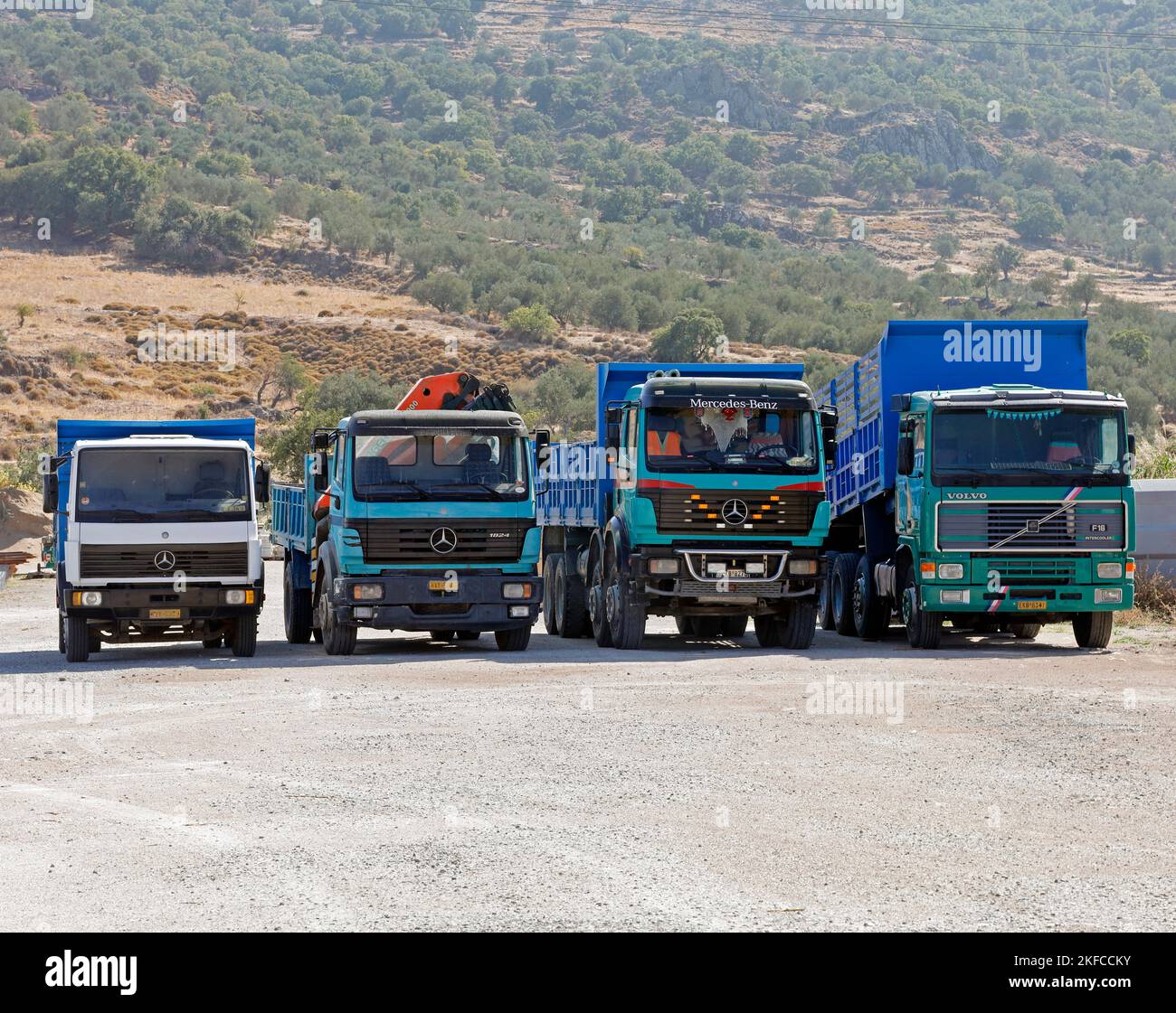Lorries parked in a row. Lesbos views October 2022. Autumn cym Stock
