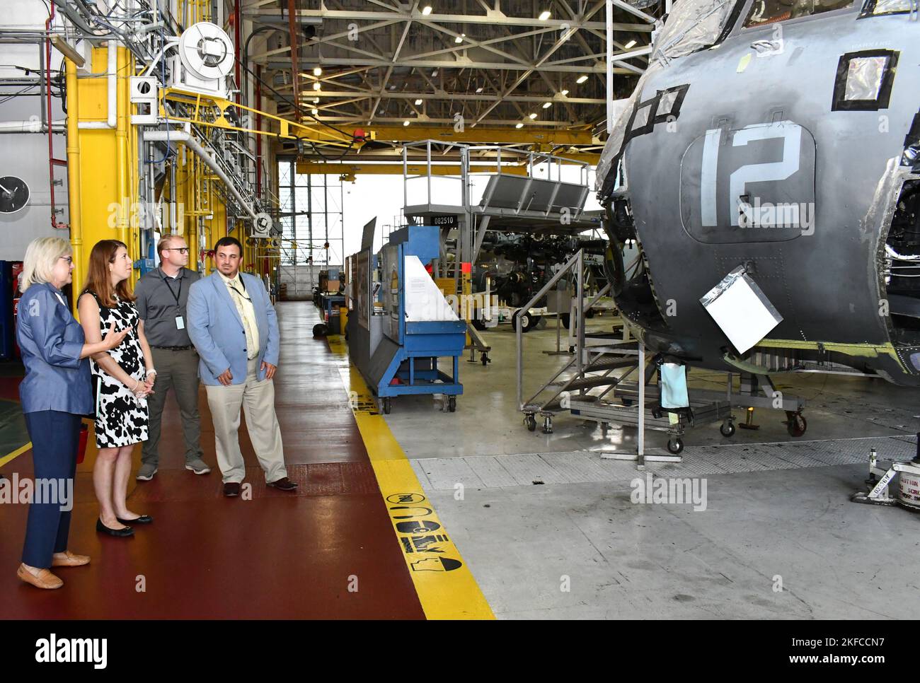 Fleet Readiness Center East (Frce) Compliance And Quality Department Head  Amy Morgan, Left, Discusses The Environmental Impacts Of Aircraft  Maintenance, Repair And Overhaul Operations With Secretary Elizabeth Biser  Of The North Carolina