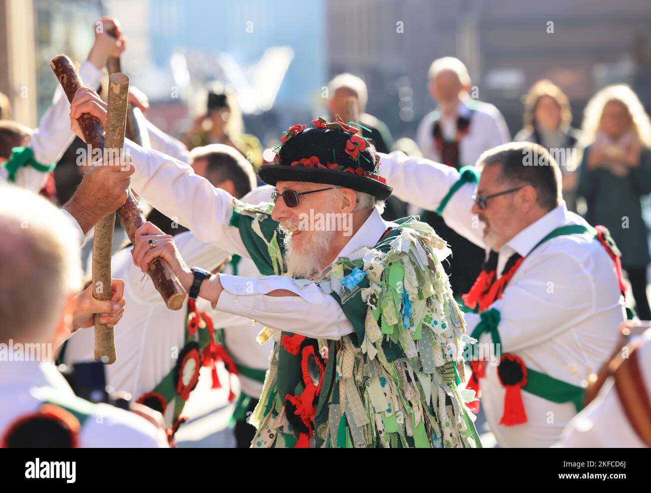 Greensleeves Morris Men performing near the Millennium Bridge between St Pauls Cathedral and Tate Modern, in London, UK Stock Photo