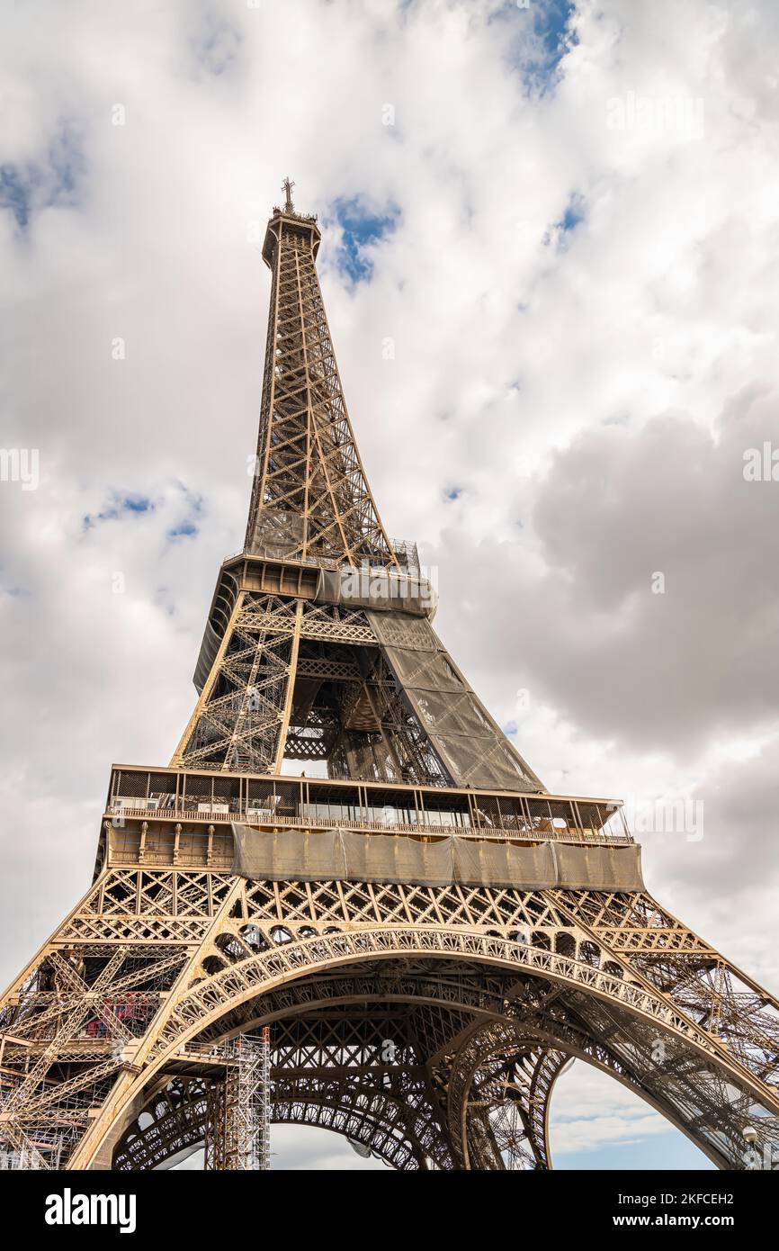 looking up at the Eiffel Tower from Rue de l'Universite, Paris, France Stock Photo