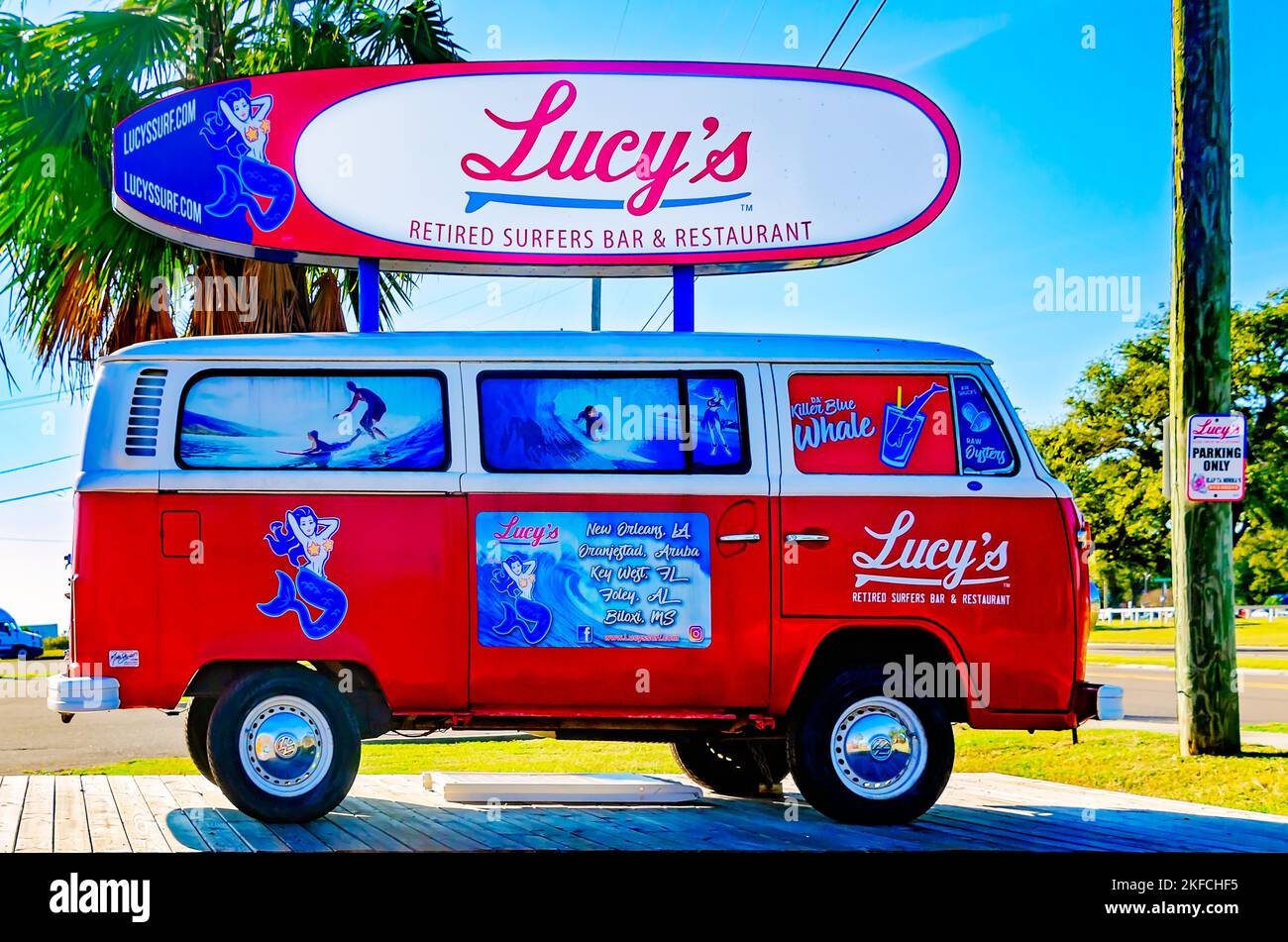 A vintage Volkswagen bus advertises Lucy's Retired Surfers Bar & Restaurant, Nov. 13, 2022, in Biloxi, Mississippi. Stock Photo