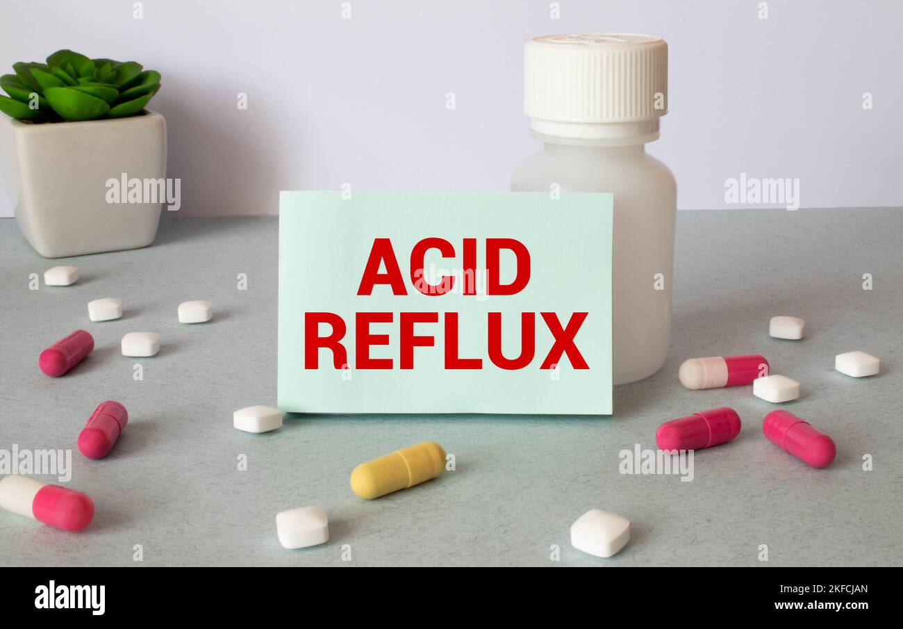 The diagnosis of acid reflux. Phonendoscope and vaccine with drugs