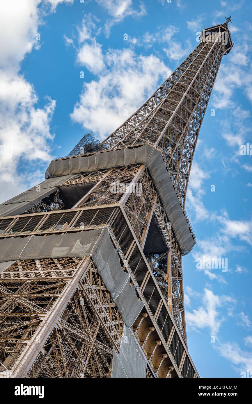 Quirky angle looking up at the Eiffel Tower, Paris, France Stock Photo