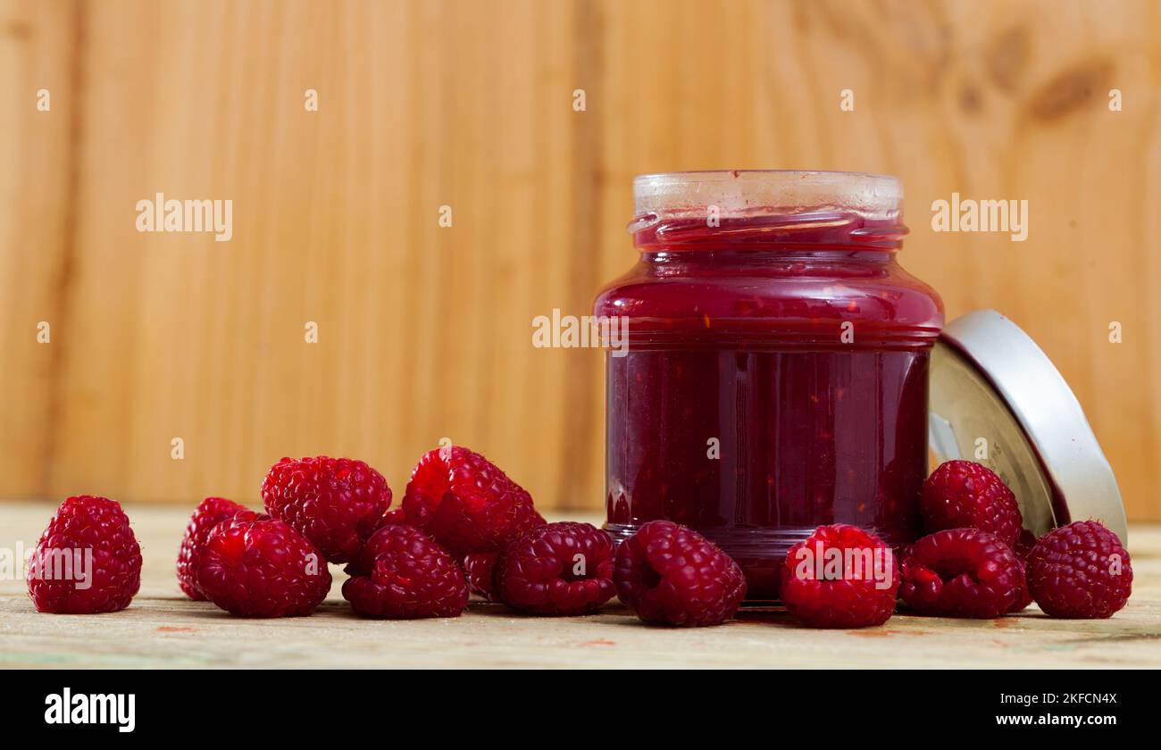 Berry jam in glass jar Stock Photo Alamy