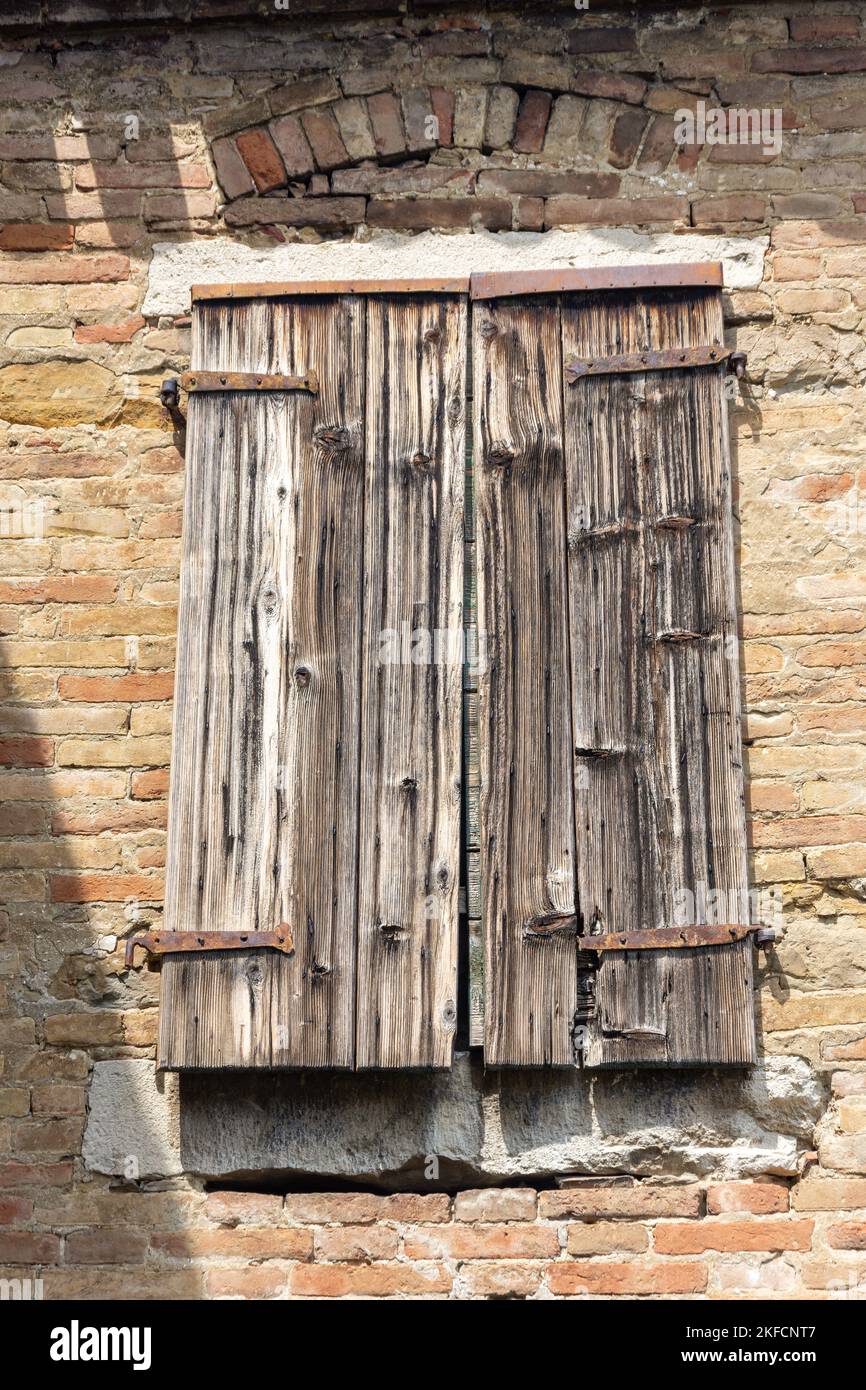 Wooden shutter in Old Town, Čevljarska ulica, Koper, Slovene Istria, Slovenia Stock Photo