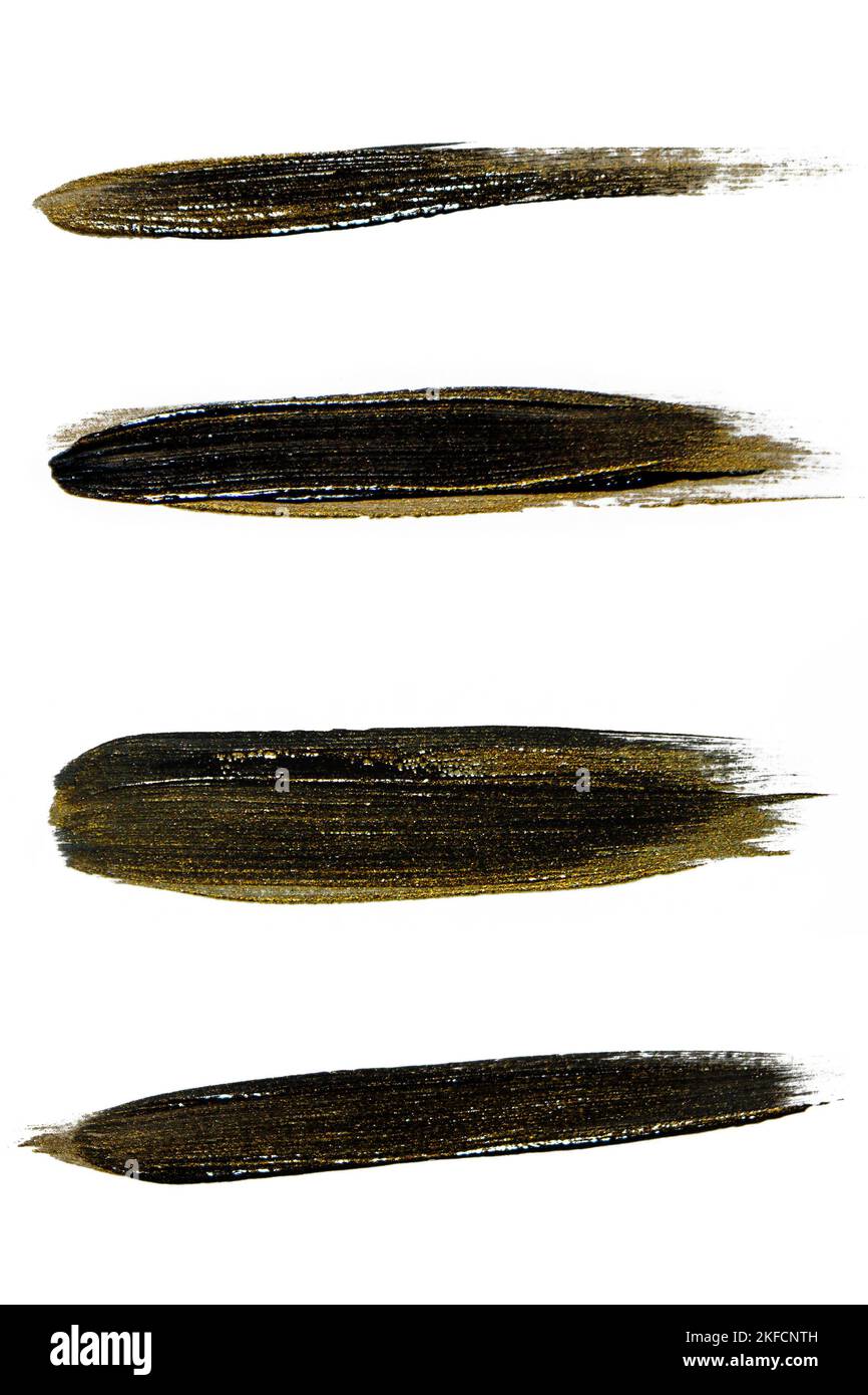 A set of black paint strokes with gold on a white background Stock ...