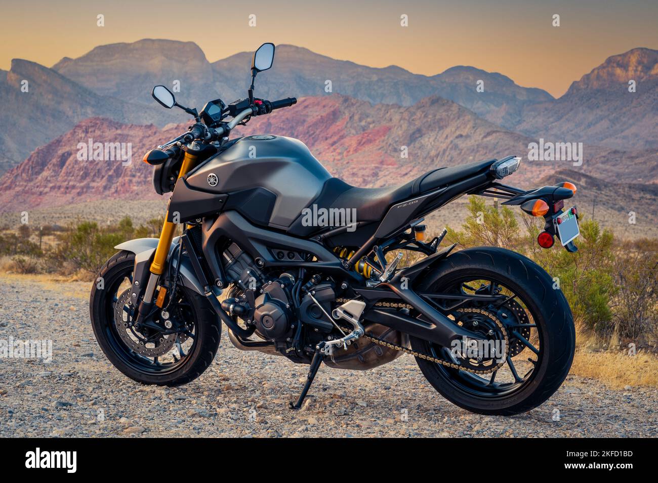 A motorcycle in front of the red rocks Stock Photo - Alamy