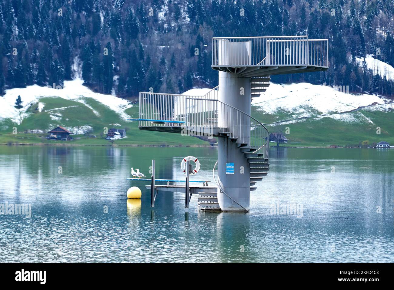 A lakeside diving platform of a local pool in Unteraegeri in Lake