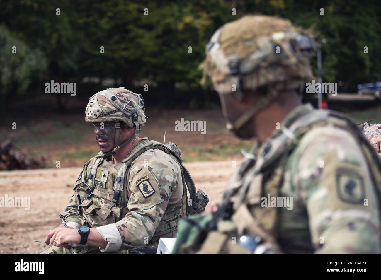 U.S. Army paratroopers assigned the 173rd Brigade Support Battalion log ...