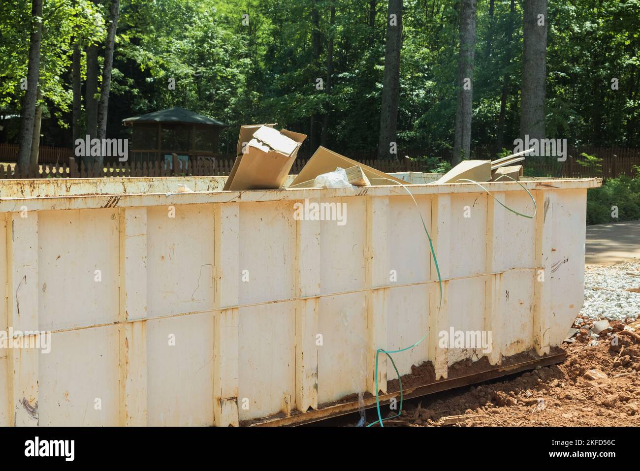 Construction site rubbish removal metal container on recycle garbage