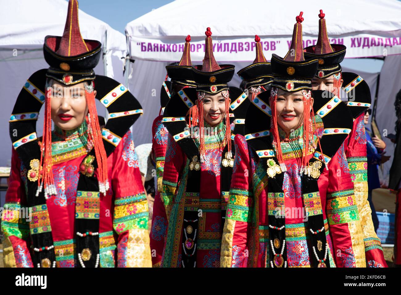 Mongolian performers in traditional dress, known as a Deel, prepare to dance in the opening of a Naadam festival held before the last day of field training exercises for Gobi Wolf 2022 in Bayankhongor, Mongolia, Sept. 9. Gobi Wolf is a disaster response exercise designed to test processes while maximizing realism through a series of scenarios. Participating countries also include Bangladesh, Nepal, Sri Lanka, Thailand, the United Kingdom and Vietnam. (Alaska National Guard photo by Victoria Granado) Stock Photo