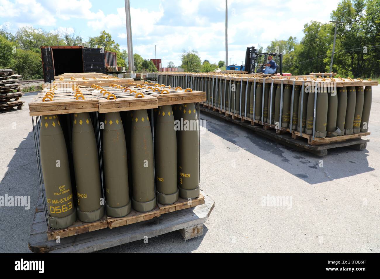 Ammo handler at Blue Grass Army Depot prepares 155mm projectile rounds