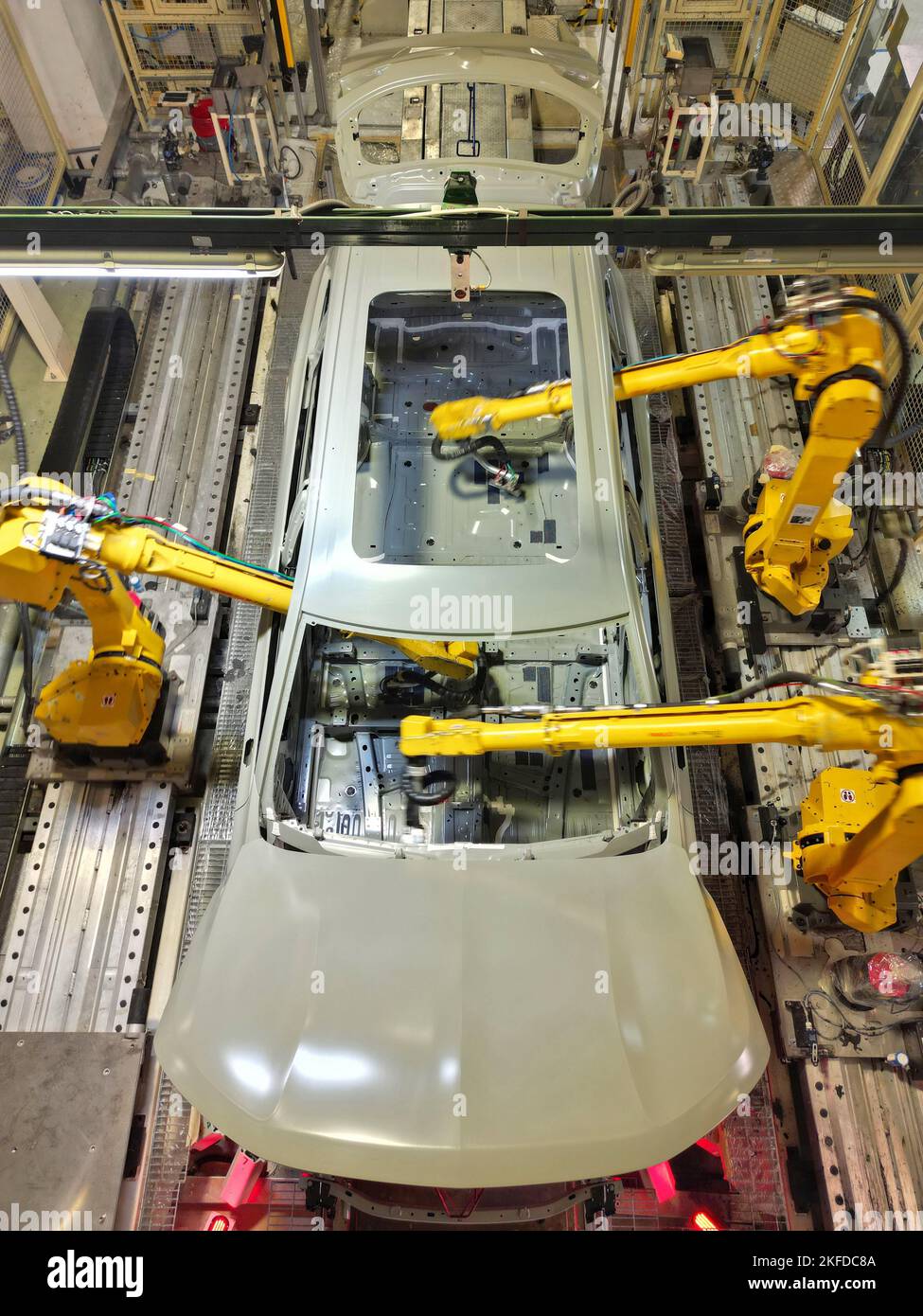 YANTAI, CHINA NOVEMBER 17, 2022 Industrial robots make cars on a