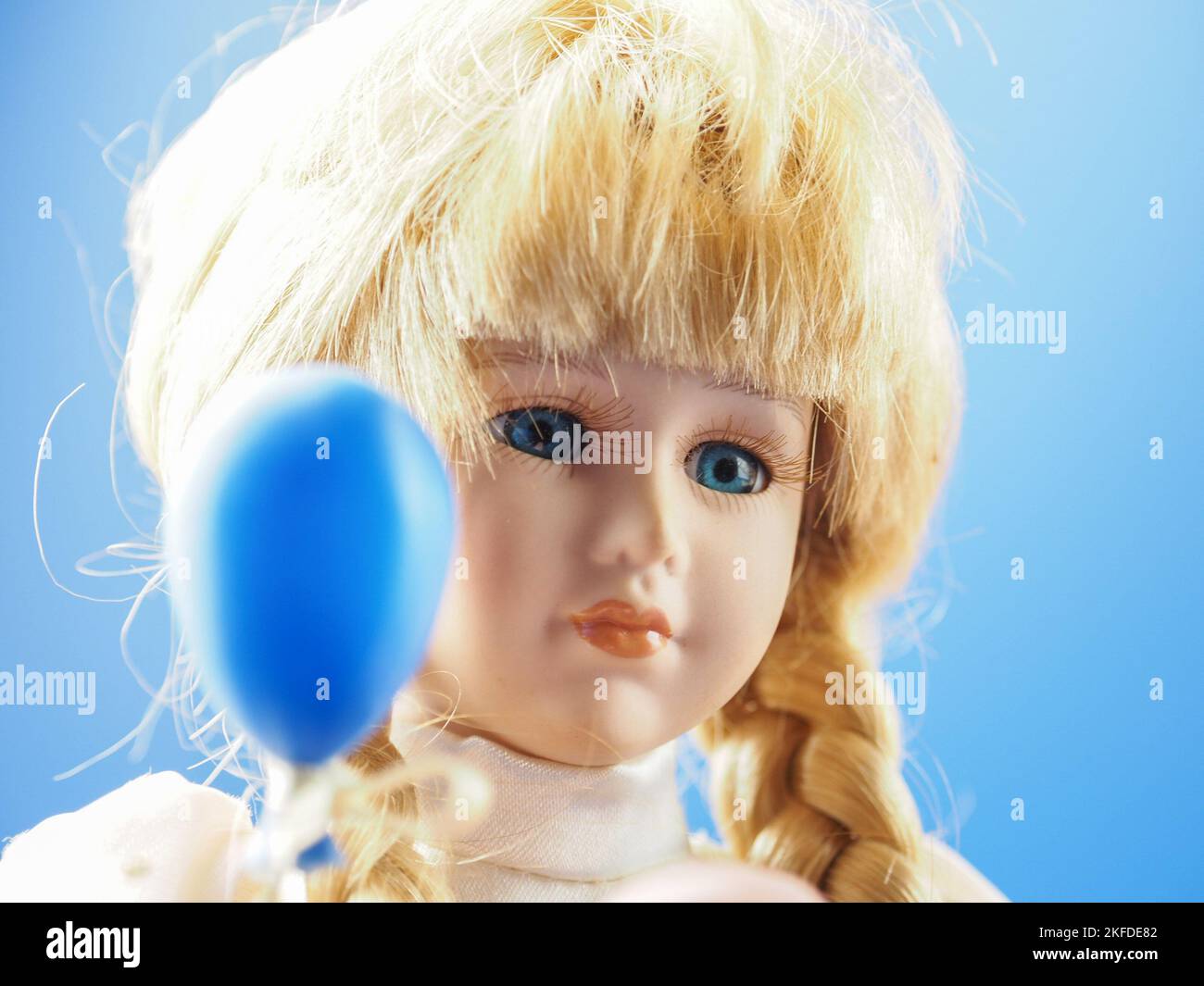 Blonde cheap porcelain doll
