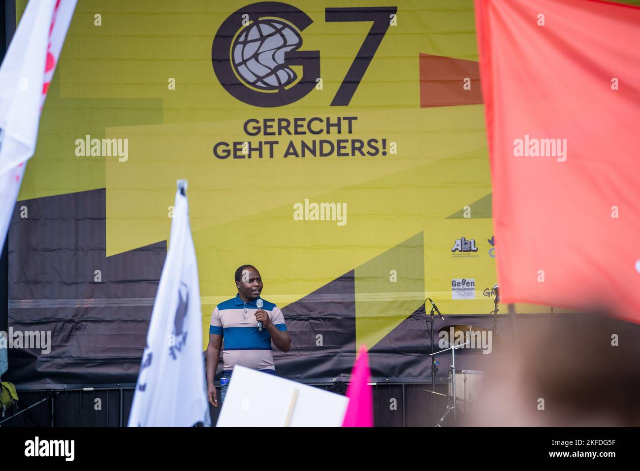 A black Speaker at protest against G7 world leader summit Stock Photo