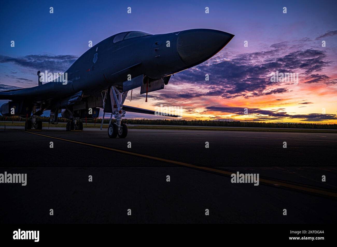 A B-1B Lancer assigned to the 7th Bomb Wing at Dyess Air Force Base, Texas, sits on the flightline at Eielson AFB, Alaska, during the Baked Alaskan exercise, Sept. 9, 2022. Two B-1’s and approximately 50 total force Airmen from the 7 BW and 307 BW engaged in the Agile Combat Employment exercise to refine multiple skills in under 24 hours. Stock Photo