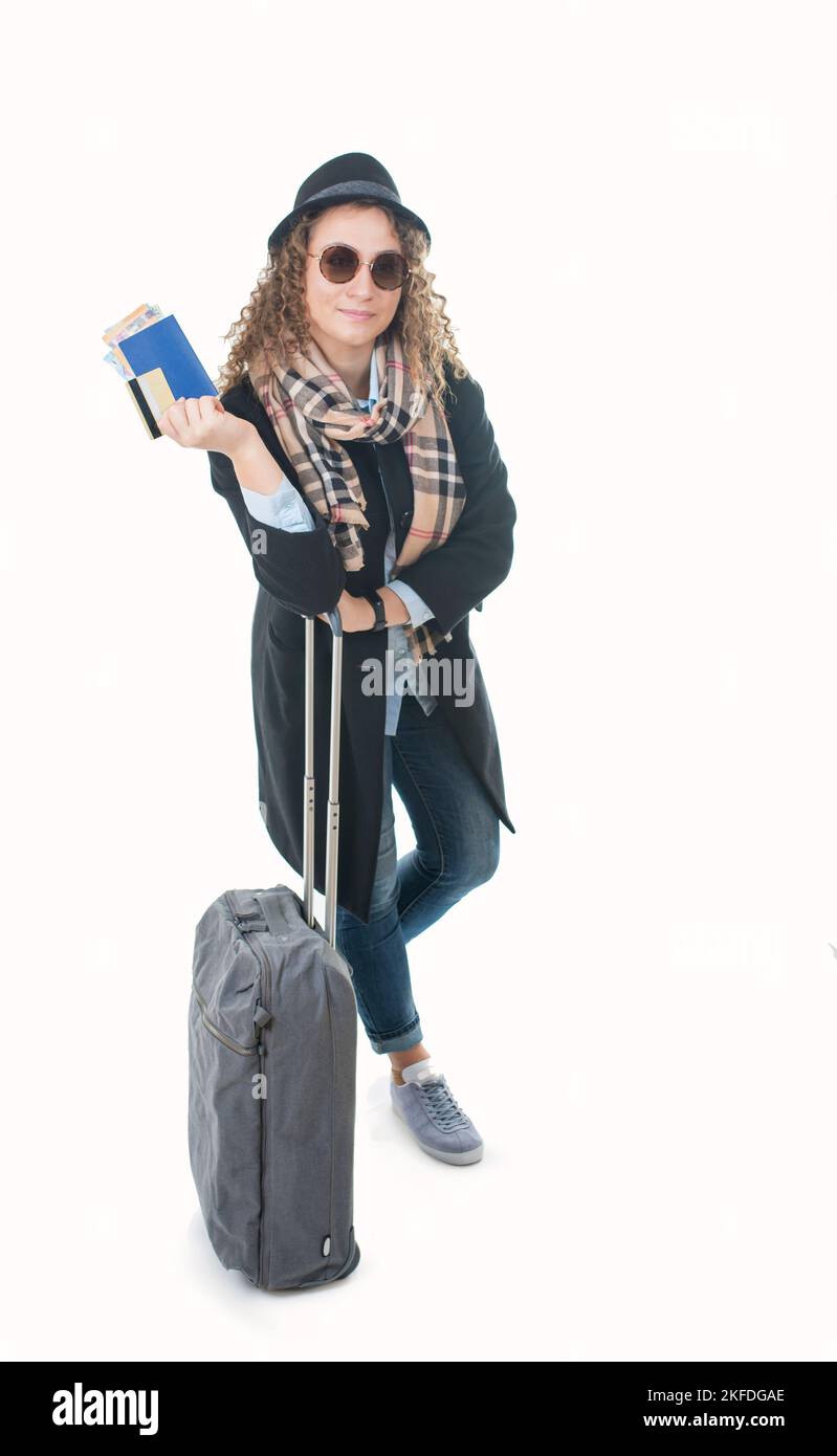 tourism, vacation, young girl with travel bag, ticket and passport on a white background Stock Photo