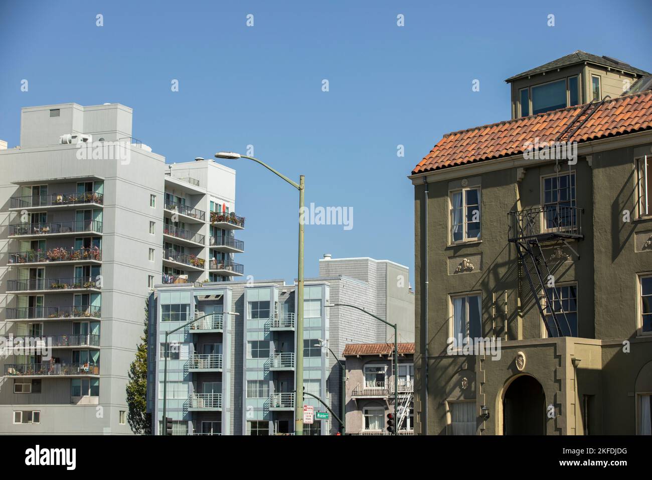 Afternoon view of dense housing buildings in downtown Oakland ...