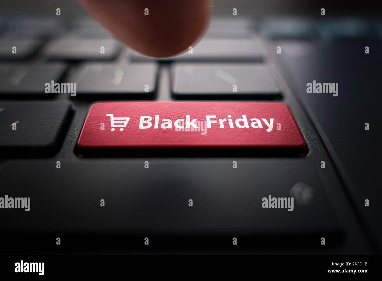 Black friday text and shopping cart on keyboard. Black friday concept