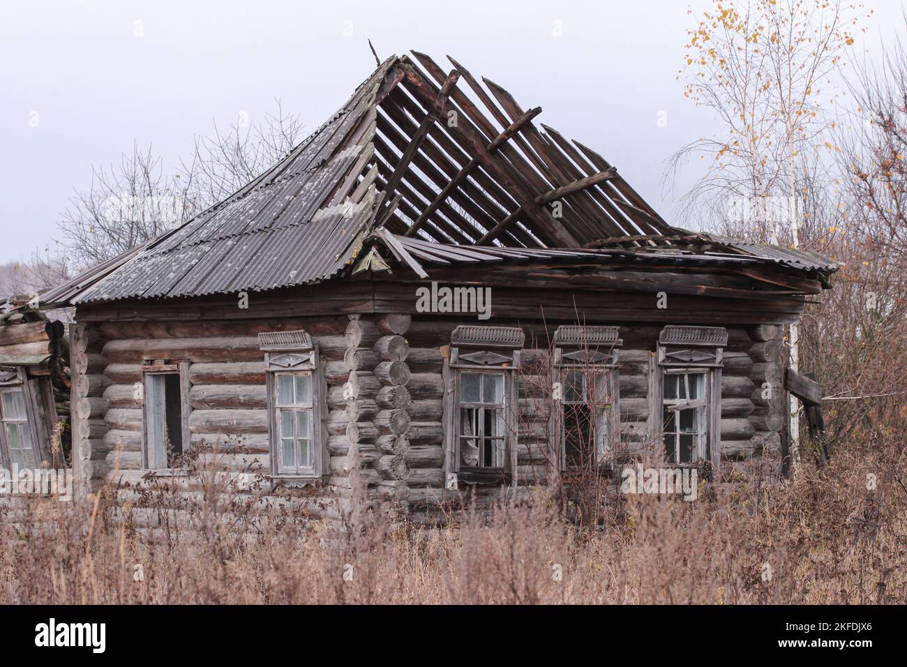 Old destroyed wooden house in the village Stock Photo