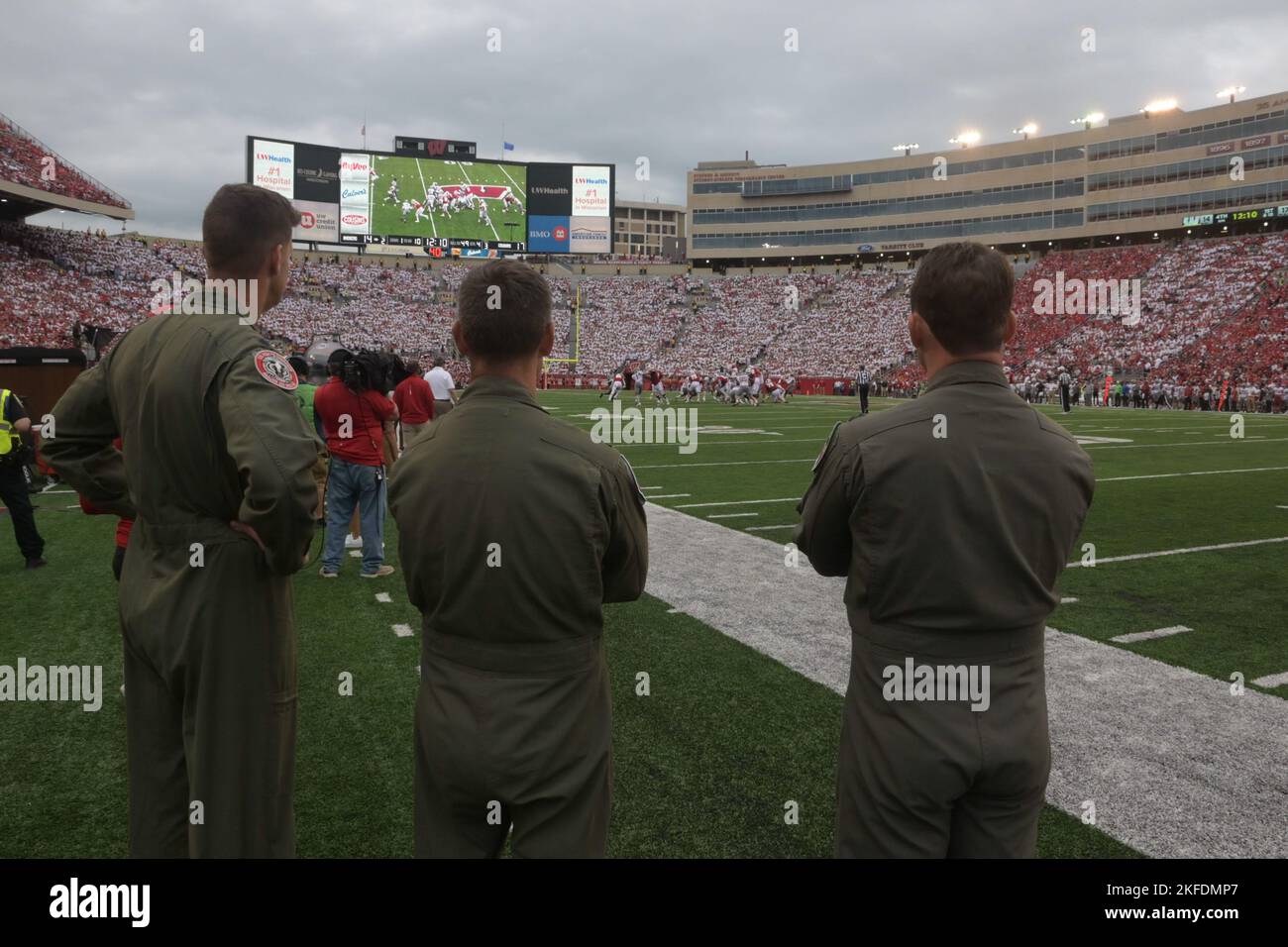 Pilots assigned to the 115th Fighter Wing take part in a flyover during a Wisconsin Badger’s football game Sept 10, 2022 at Camp Randall Stadium in Madison, Wisconsin. This is the last F-16 Badger Flyover for the 115th as the wing begins the transition from the F-16 Fighting Falcon aircraft to the F-35 Lighting II aircraft. Stock Photo