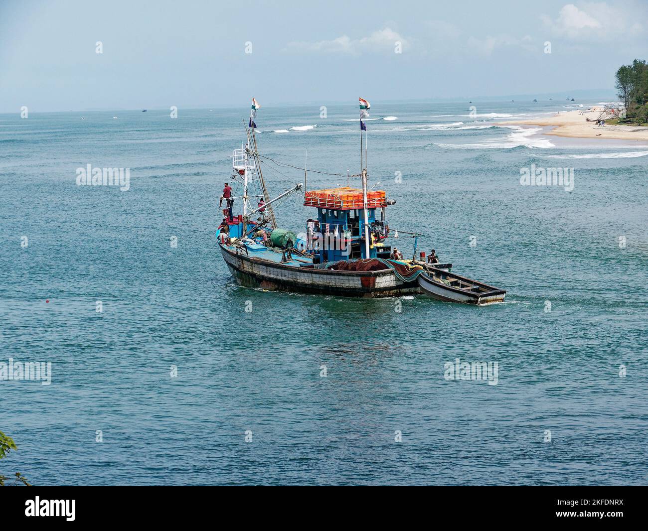 Fishing trawler entering a Arabian Sea at Betul in state Goa India ...