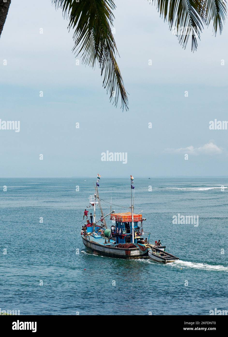 Fishing trawler entering a Arabian Sea at Betul in state Goa India ...