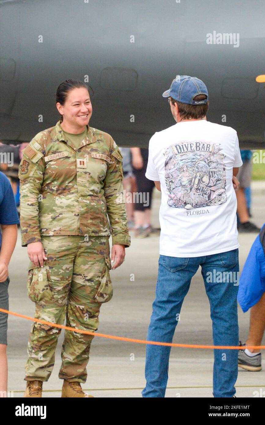 Capt. Melia Lougheed of the 134th Aircraft Maintenance Group chats with a guest outside of the KC-135 Stratotanker on display at the Smoky Mountain Airshow Sept. 11, 2022.    Members of the 134th Air Refueling Wing were on hand to assist the public at the Smoky Mountain Air Show, taking place at McGhee Tyson Air National Guard Base on September 10-11th, 2022. Stock Photo
