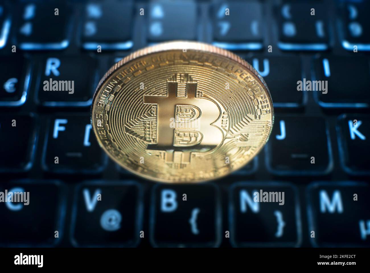 Bitcoin on computer trading background. Virtual cryptocurrency concept. Stock Photo