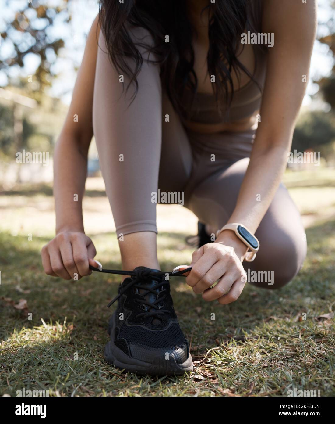 Woman walking to work training shoes hires stock photography and