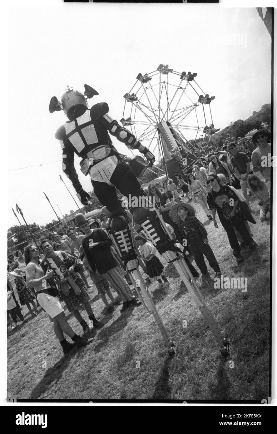 A stilt-walker at the Circus Field at Glastonbury Festival, Pilton, England, June 25-27 1993. Photograph: ROB WATKINS Stock Photo