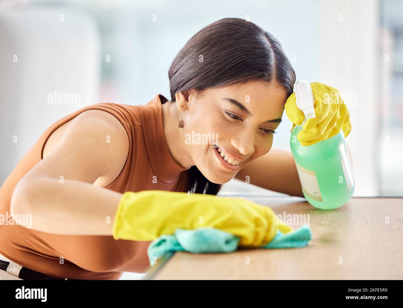 Cleaning, bottle and black woman spray table, desk or furniture