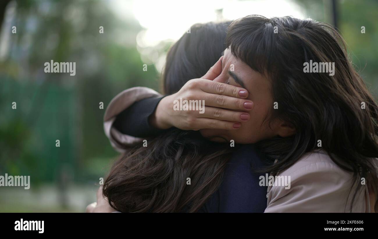 Sympathetic woman hugging friend with EMPATHY and SUPPORT. Friendship ...