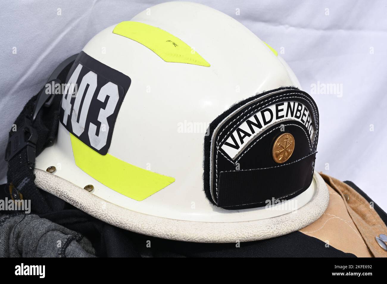 A firefighter’s helmet is on display during a 9/11 Remembrance Ceremony at Vandenberg Space Force Base, Calif. Sept. 11, 2022. The ceremony was in remembrance of the and honor of the 343 firefighters, first responders and victims of the attacks on the World Trade Center, Pentagon, and our Nation. Stock Photo