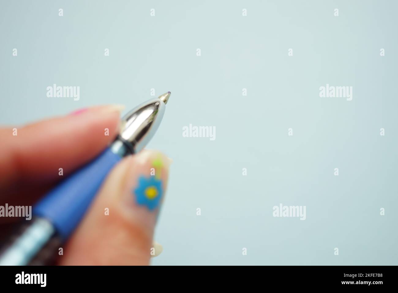 Blue paper background hand hi-res stock photography and images - Alamy