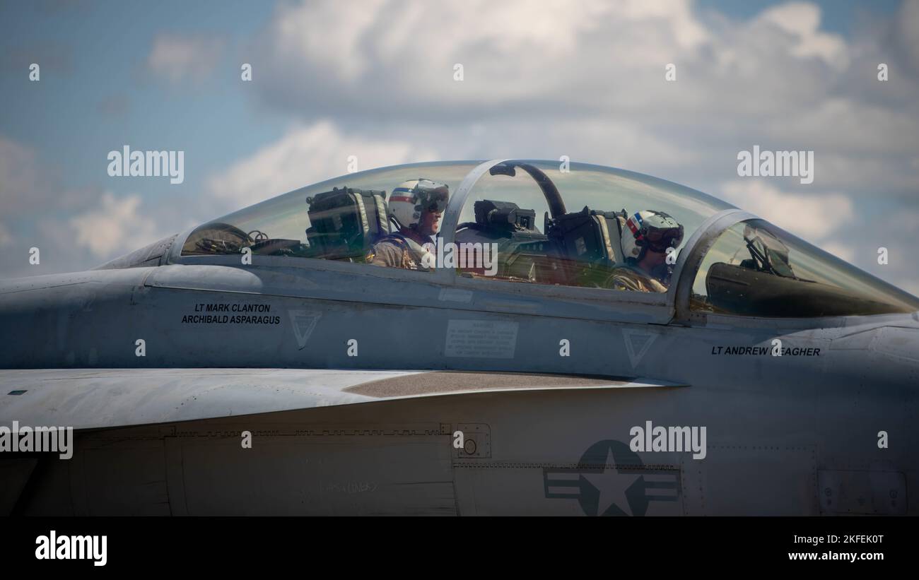 U.S. Navy aircrew assigned to Strike Fighter Squadron (VFA) 2, Naval Air Station Lemoore, California, taxi in an F/A-18 Super Hornet during Weapons System Evaluation Program-East 22.12 at Tyndall Air Force Base, Florida, Sept. 12, 2022. WSEP-E 22.12 is a formal, two-week evaluation exercise designed to test a squadron’s capabilities to conduct live-fire weapons systems during air-to-air combat training missions. Stock Photo