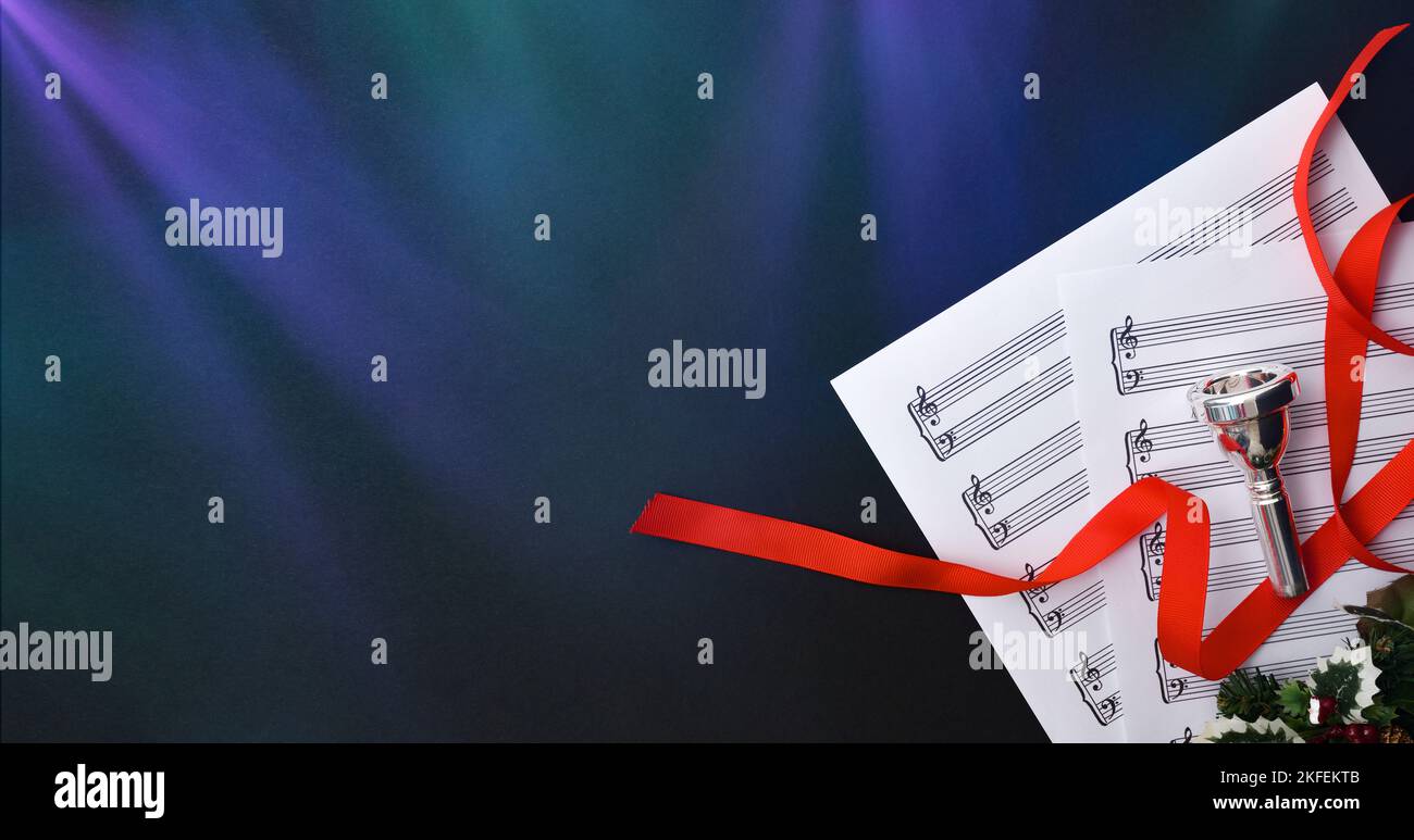 Christmas performance of brass instruments background with mouthpiece