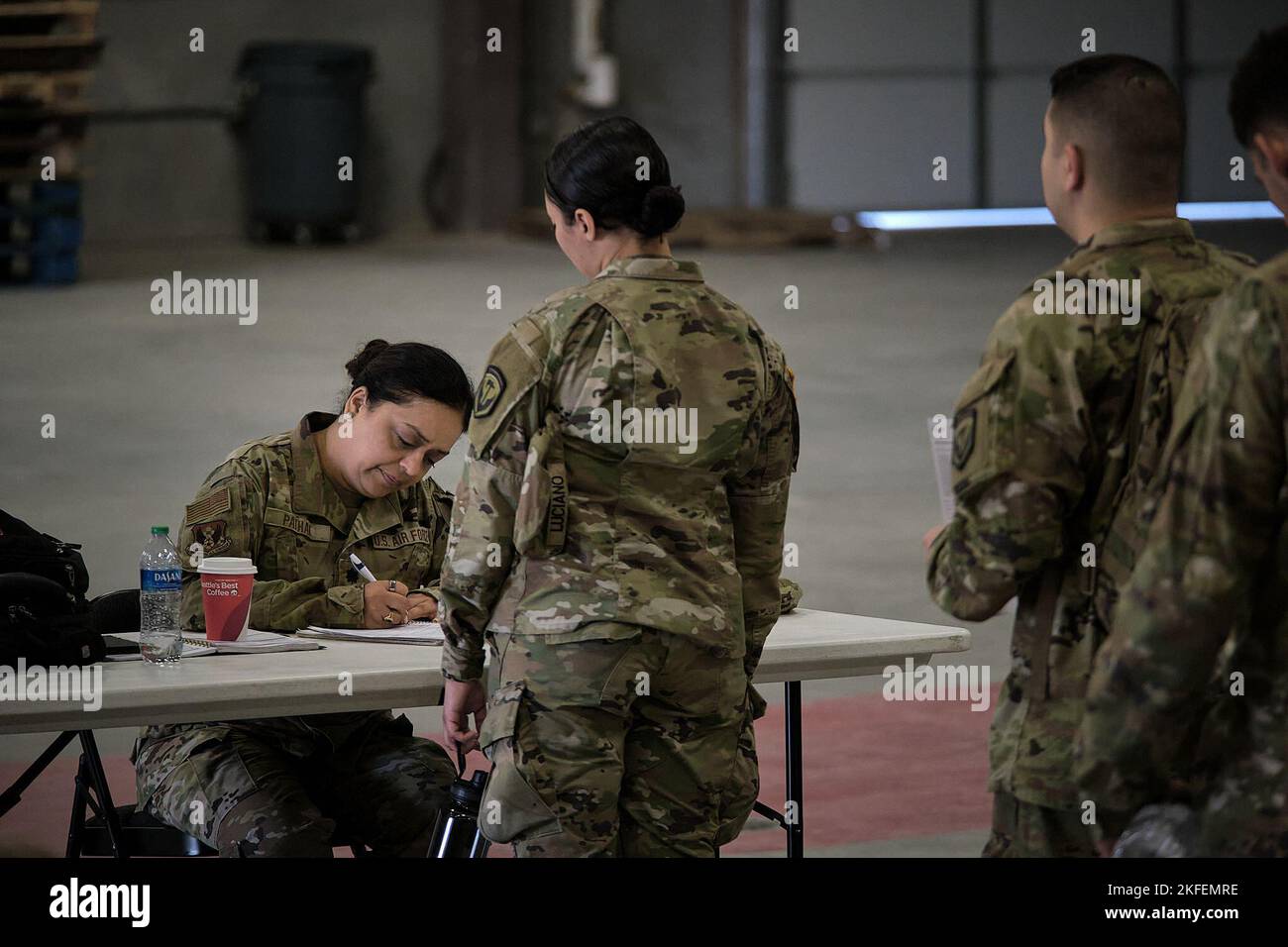 Lt. Col. Lisa Pathak, a 105th Medical Group physician, checks guardsmen pre-deployment vitals before they enter a mock hot-zone disaster area during a New York National Guard joint training exercise and external evaluation of the Chemical, Biological, Radiological and Nuclear Task Force and Homeland Response Force for FEMA Region II, in Fort Indiantown Gap, Pennsylvania, September 12, 2022. Stock Photo