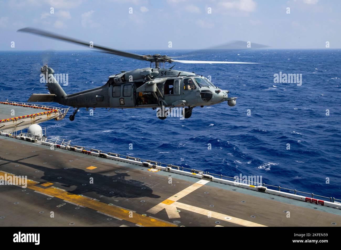 220913-N-CM110-1122 PHILIPPINE SEA (Sept. 13; 2022) – An MH-60S Sea ...