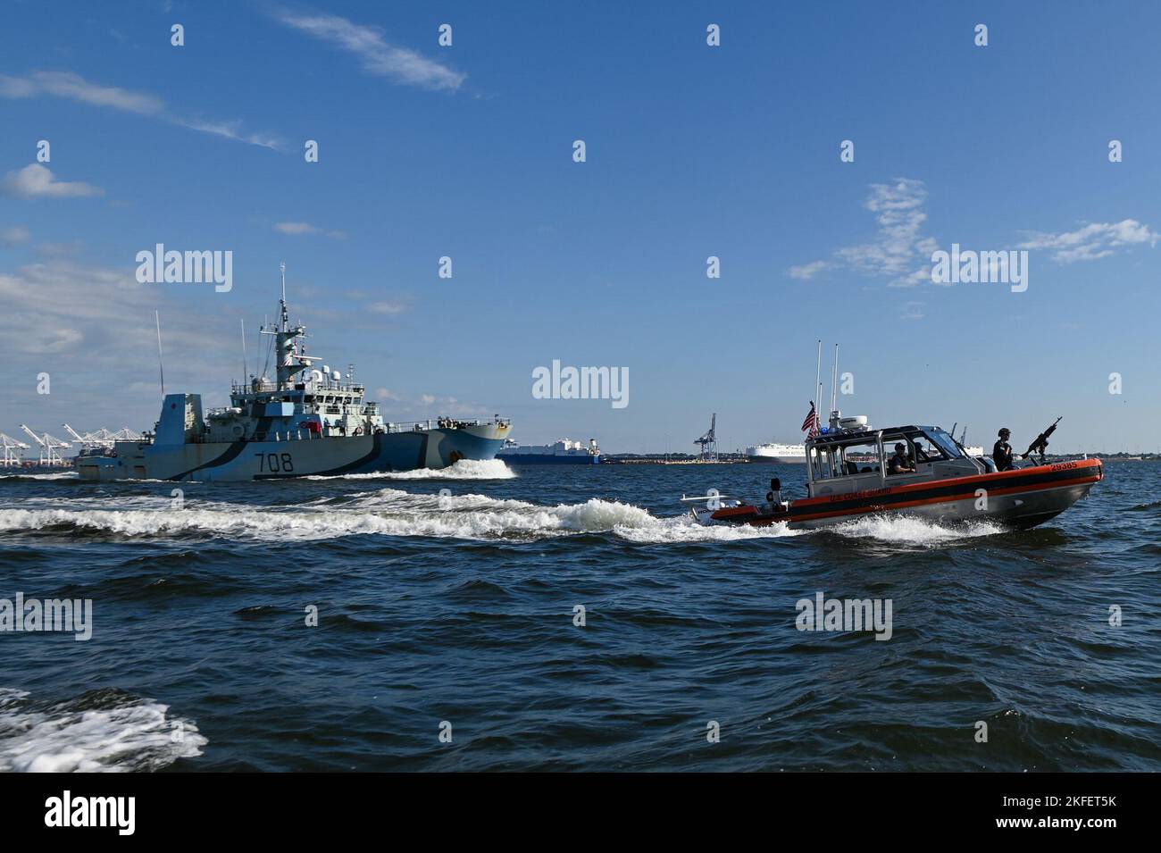 A Maritime Safety and Security Team boatcrew escorts a Canadian Coast Guard  ship leaving the Baltimore Harbor at the completion of Maryland Fleet Week  and Flyover Baltimore, August 13, 2022. Fleet Week